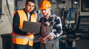 Two colleagues at a factory